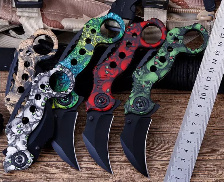 Cuchillo Karambit semi automatico diseño calavera