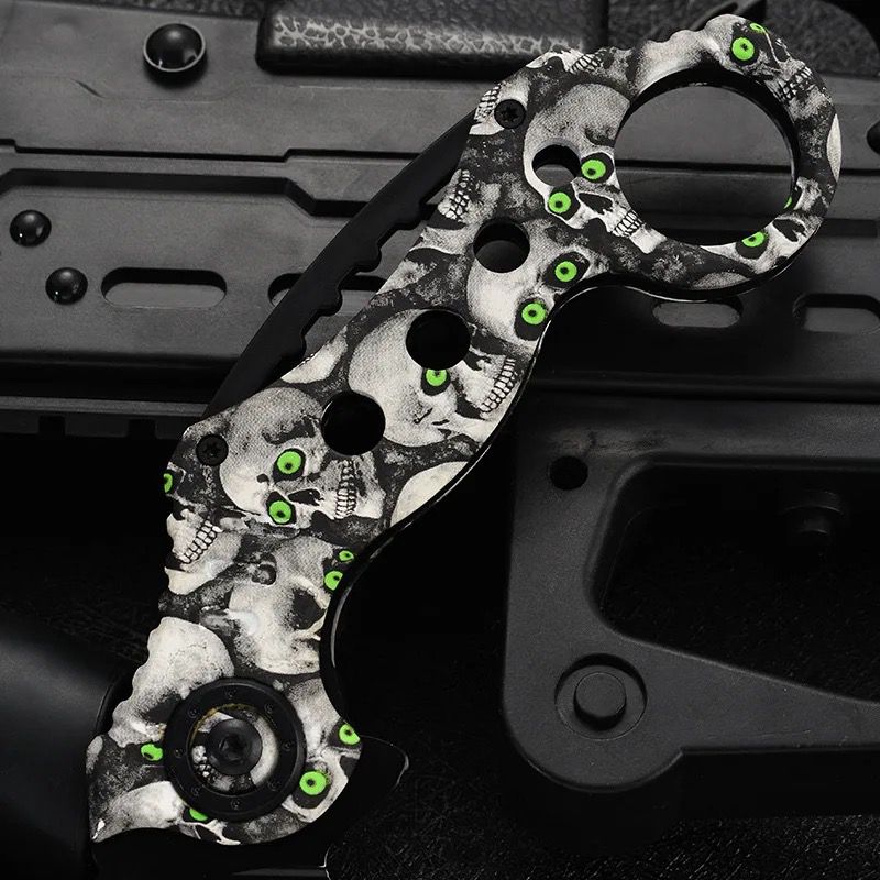 Cuchillo Karambit semi automatico diseño calavera